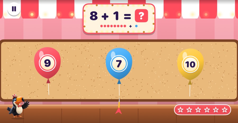 Balloon Pop booth in Mathing: Aim a dart at the balloon holding the answer. Pop!
