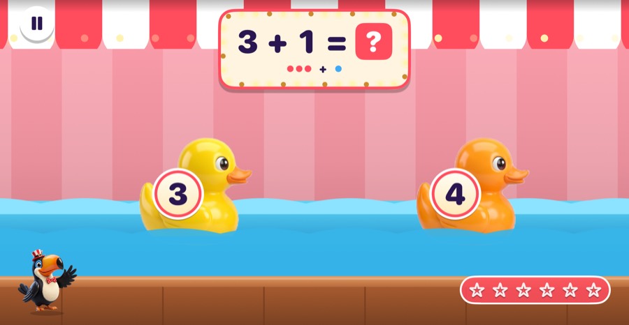 Duck Pond booth in Mathing: Rubber ducks float past with numbers on them. Tap the duck with the answer and the hook fishes it out.