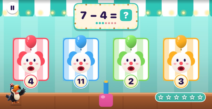 Water Gun Race booth in Mathing: Splash the clown target with the right number to win the race.